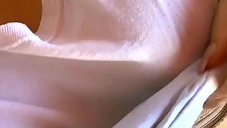 Busty curly brunette with big boobs fucks on couch