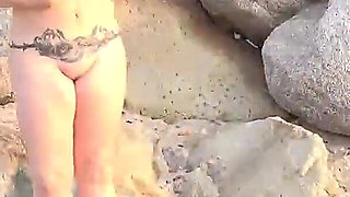 Nymph of the Sea Masturbates on Beach