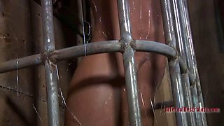 Chained woman in the cage endures extreme humiliation BDSM porn