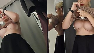 I try on transparent clothes in the fitting room. Amateur video in dressing room