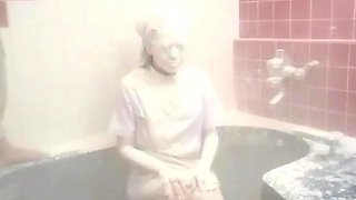 Asian girl gets a piss bukkake