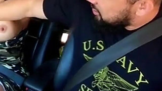 Traffic Blowjob: Exhibitionist Brunette Shows Her Tits and Sucks It All in the Car