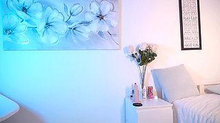 Undresses and puts on white stockings