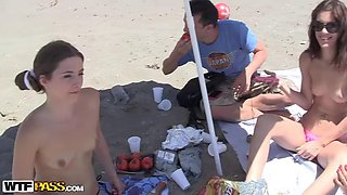 Wild college students fucking on a public beach