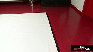 Wrestling lez MILF fights hairypussy babe in wrestling arena