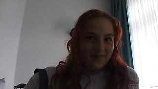 Hairy redhead bbw fingers her pussy on the bed