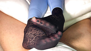 Nylon footjob in leopard nylon socks