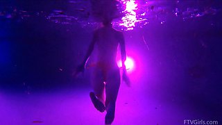 Natural tits brunette Lily swims in the pool and masturbates.