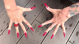 Long Red Nails and Long Fingers in Swimming Pool