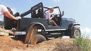 Get out of the car and push the car harder...