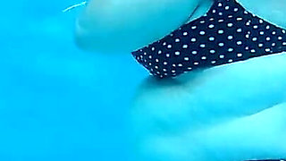 Couple Underwater Diving and Swimming