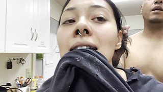 fucking her hard in doggy when she's cooking in the kitchen
