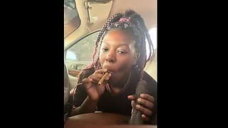 Amateur ebony MILF sucks off big black cock in the car