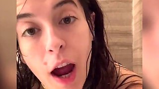 Skinny brunette Abbie Maley takes a shower and teases her sexy body