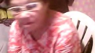 Mature Asian Elizabeth, 57, Flashes on Webcam