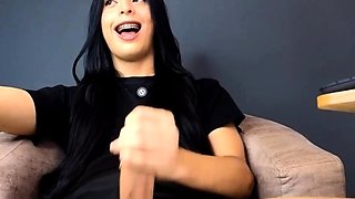 Stunning TS beauty strokes her massive hard cock