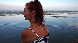 Unstripping on beach of Volga-river