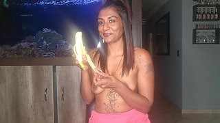 Topless Desi Squeezes Her Boobs as She Sucks and Deepthroats on a Banana