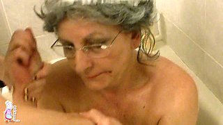 Four eyed granny gets her hairy pussy teased by her lesbian friend