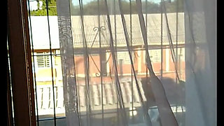 My stepmother trimming her hair and showing off to the street, filmed and sent me and asked if it was good.