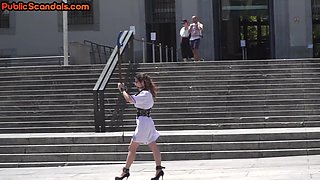 Public BDSM babe deepthroats hard cock in front of voyeurs