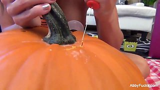 Abigail carves a pumpkin then gets off in the mess Abigail