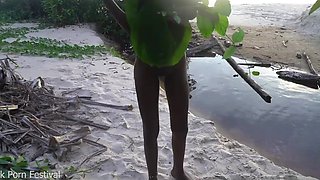 African harlot plays with fire naked