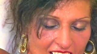 Wet Lesbians Fingering Each Other in Steamy Bathtub