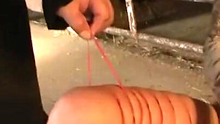 Humiliating candle in pussy