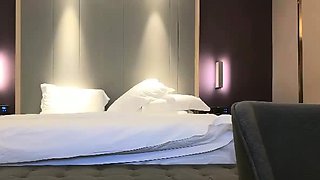 Cute amateur asian web cam girl playing with her toy