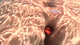 Naked MILF Swimming with Anal Plug Underwater