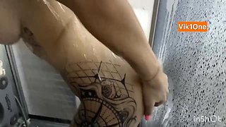 Blonde in the Shower Fucks Herself with a Dildo