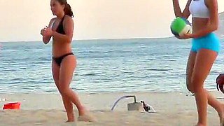 Hot beach voyeur with hot babes in tight shorts playing volleyball