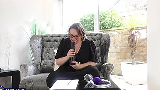 Hot brunette Cashmere in stockings and glasses plays with her big natural tits