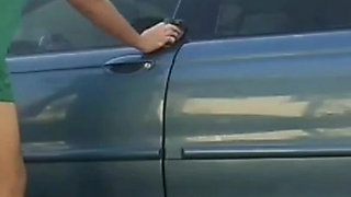 Jesus in red boxer washing his jaguar car