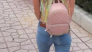 Public Wetting Jeans in Park Near the Beach