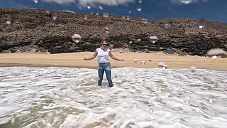 Girl Wetting Jeans in the Ocean and Swimming in Wet White T-shirt