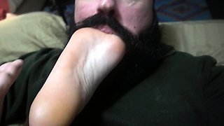 Light femdom and foot fetish play with brunette