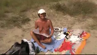 mature voyeur masturbates and sucks on beach