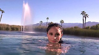 In the pool, she moves with sensuality