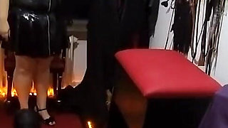 Busty Dominatrix Teases Bound Slave's Throbbing Cock in Dungeon