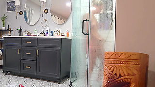 Stepson gets caught watching his stepmother shower