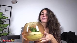 Babe with Hairy Pussy Pisses Into a Angle Bowl