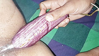 Asian sexy girl took down a brinjal