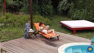 Gigi the Naughty Mature Fingers Her Bushy Unshaved Pussy Outdoors in the Garden Before Swallowing Th
