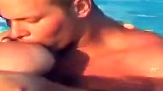 Busty blondie gets cum in mouth while fucking by the swimming pool