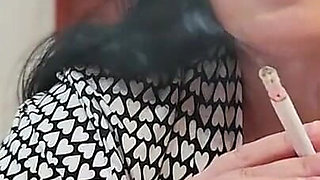 POV: My Busty Stepmom Nicole Smokes a Cigarette While Sucking My Stepfather's Cock Until He Cums in Her Mouth.