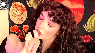 Tattooed busty brunette with foot fetish does hot footjob
