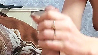 Handjob of a Brunette
