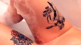 Busty curly brunette with big boobs fucks on couch